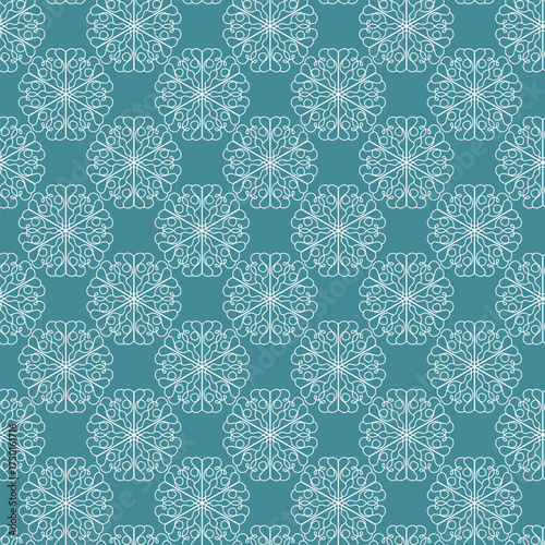Winter seamless pattern with white snowflakes on blue background. Vector illustration for fabric, textile wallpaper, posters, gift wrapping paper. Christmas vector illustration.