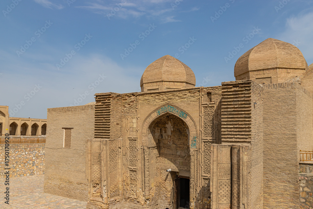 Fototapeta premium Facade of Magoki-Attari Mosque, most old building in Bukhara, Uzbekistan. Entrance to building is 4.5 m below current earth level. According to legend, it was built on site of ancient temple of fire