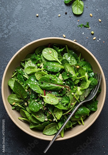 Vibrant, fresh green salad with a variety of leafy vegetables, herbs, and other wholesome ingredients. Perfect for healthy eating ,superfood ,meal ,herbs