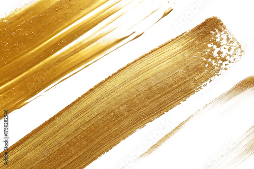 Abstract golden brush strokes with metallic sheen on a dark black background texture