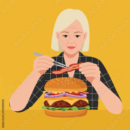 A woman carefully adds bacon to a large, layered hamburger