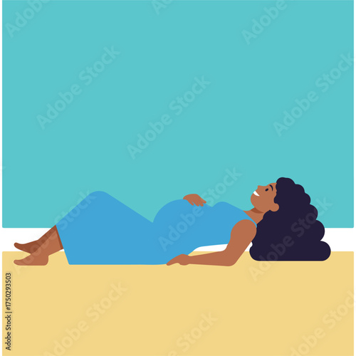 Pregnant woman relaxing on sand under blue sky, smiling and holding her belly