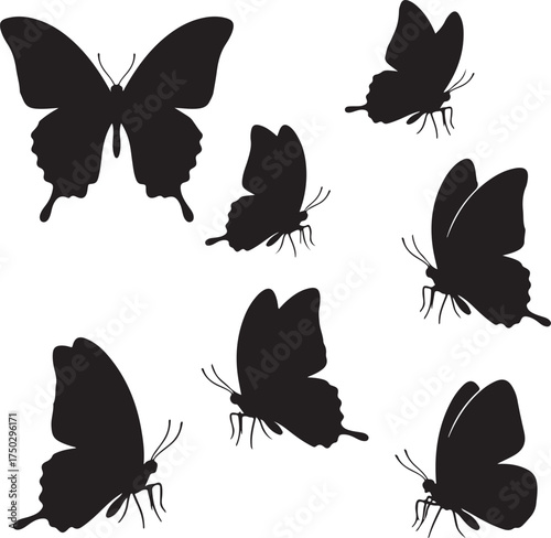Graceful Butterfly Silhouettes: An artistic display of multiple black butterfly silhouettes against a minimalist backdrop, capturing the delicate beauty of nature.