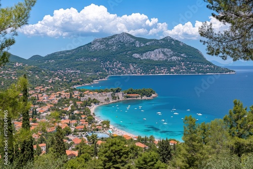Fototapeta Naklejka Na Ścianę i Meble -  Panoramic view of coastal town, turquoise water, mountains