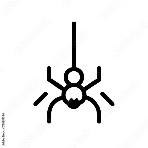 A close up shot of a black cat with bright green eyes looking directly at the camera with a soft focus background