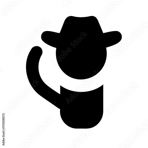 A solitary black crow perched on a weathered moss covered stone wall under a dramatic cloudy sky evoking a sense of mystery and solitude