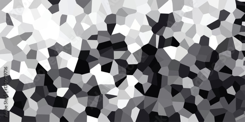 Monochrome geometric mosaic background with sharp, angular polygons in shades of black, white, and grey, offering a stark and dynamic visual texture