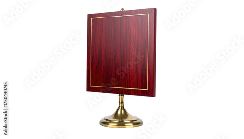 Richly-grained wooden plaque with gold trim, mounted on a brass pedestal