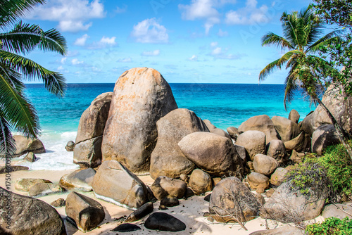 Tropical Beach with big Rocks and Palmtrees in Seychelles