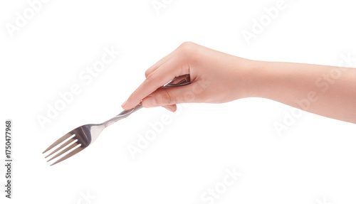 Female hand holding a shiny silver fork, isolated