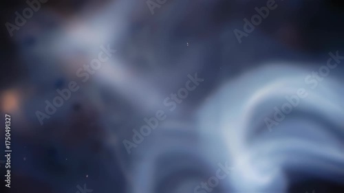 Abstract blue smoke swirling in the air, ethereal and mysterious.