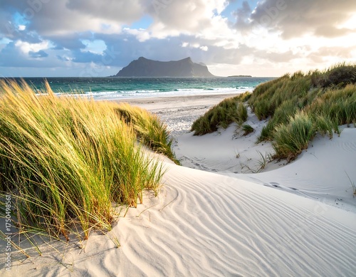 Fototapeta Naklejka Na Ścianę i Meble -  Coastal scene with sand dunes, beach, sea, and mountain