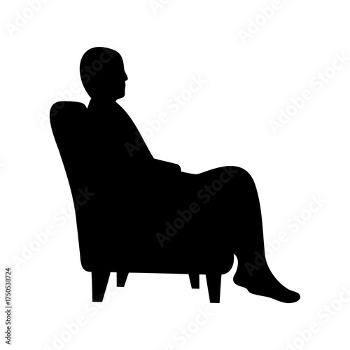 Silhouette of a person seated in an armchair, resting, in black and white