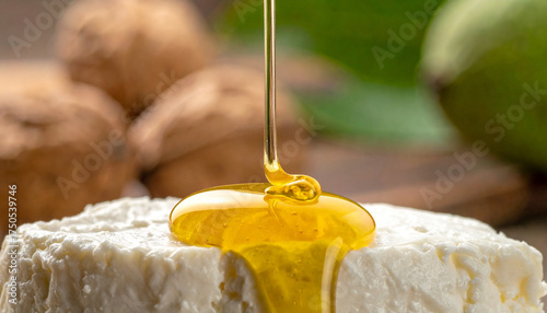Macro detail of walnut oil drop spreading on cottage cheese