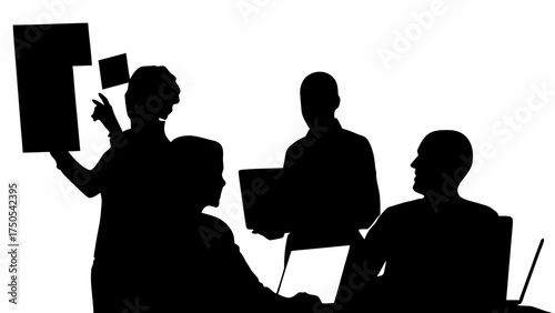 Business team collaborating during a presentation with charts and laptops in a modern office setting