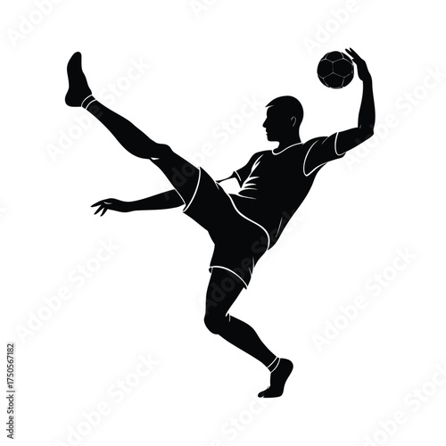 Silhouette of a soccer player kicking a ball overhead