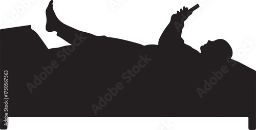Silhouette of person lying in bed holding remote control