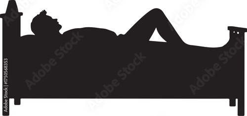 Silhouette of person lying on a bed sleeping