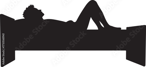 Silhouette of person lying on bed with legs bent lying down
