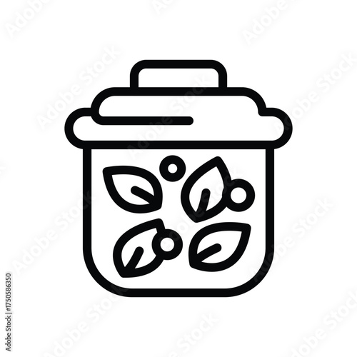 A pot with a lid contains leaves and round items