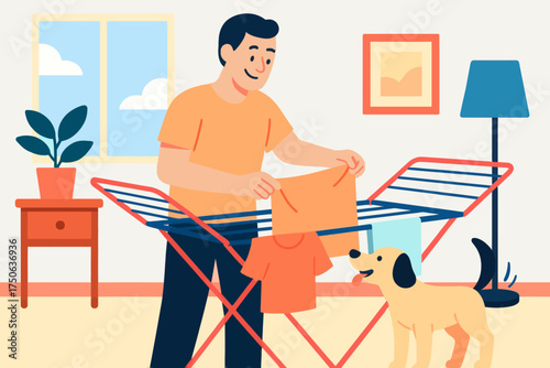 A young man hangs clean clothes on a drying rack at home, illustrating laundry care and household chores.