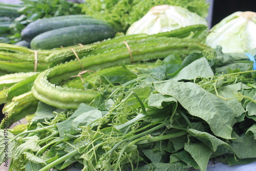 Assorted vegetables on wooden table
