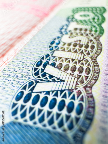 Schengen Visa in passport for world travel, EU visa for Italy, Immigration to England, illegal migrants, tour, airport, customs, news, closed borders, nationality. Macro photo. High quality photo