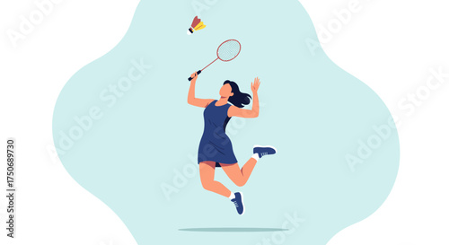 Young woman playing badminton in a sporty outfit during a match.
