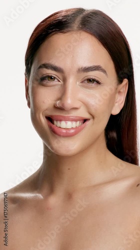 Face mist, skincare or woman with smile in studio, natural beauty or hydration for wellness glow. Portrait, person or dermatology with spray for skin shine, self care and brighten on white background