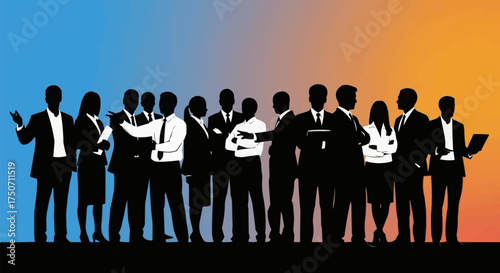 Business professionals standing together in a group discussing ideas.