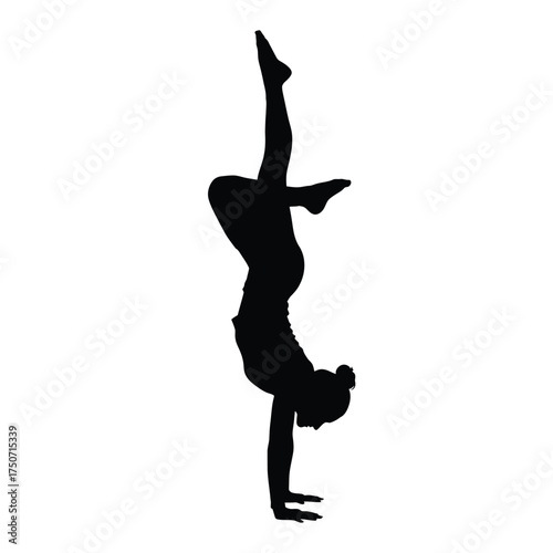 Silhouette of a woman in a handstand position with legs bent and pointed upward against white