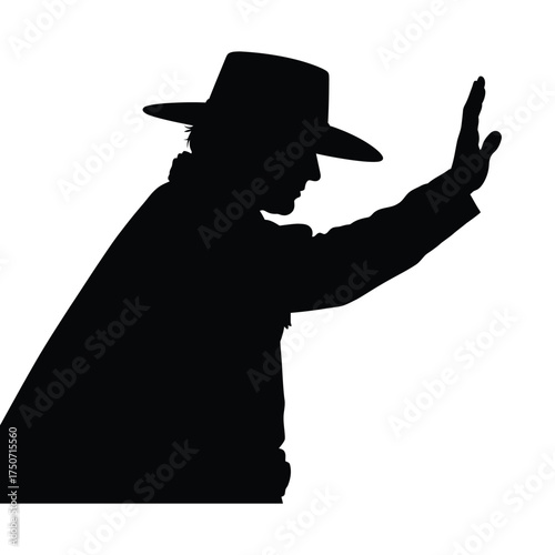 Silhouette of a person wearing a hat and coat with their hand raised against white background