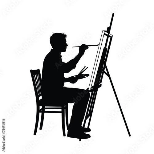 Silhouette of a man sitting on a chair painting on a canvas with an easel and holding a palette