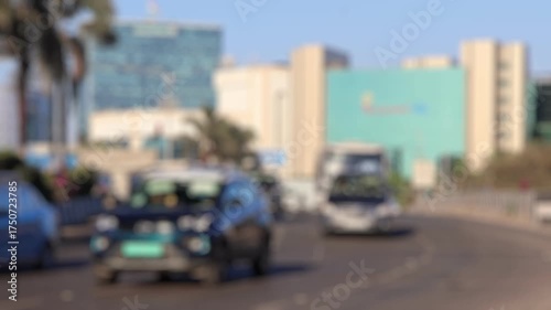 Bokeh view of road traffic near Bandra Kurla Complex area - commercial district of Mumbai, India. Blurred background footage.