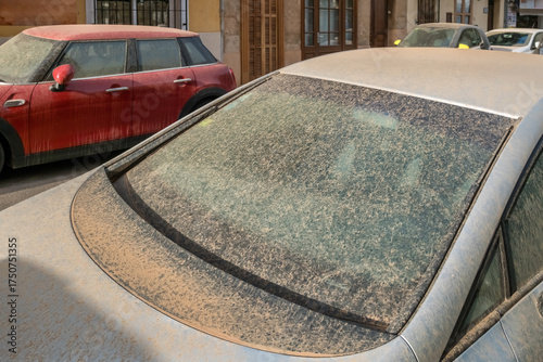 Dust and dirt on a car due to a sand storm from the Sahara desert.