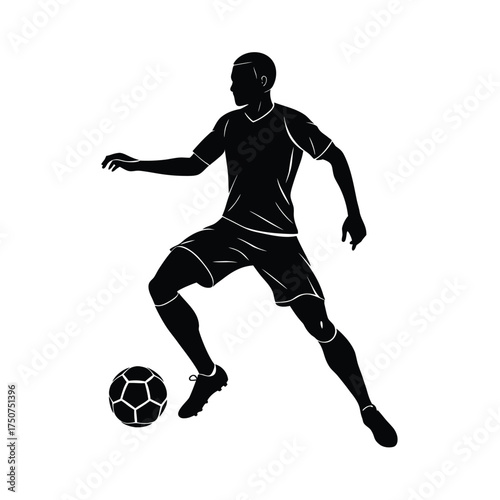 Silhouette of a soccer player dribbling ball football