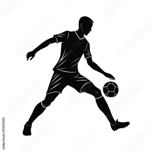 Silhouette of a soccer player controlling ball with foot