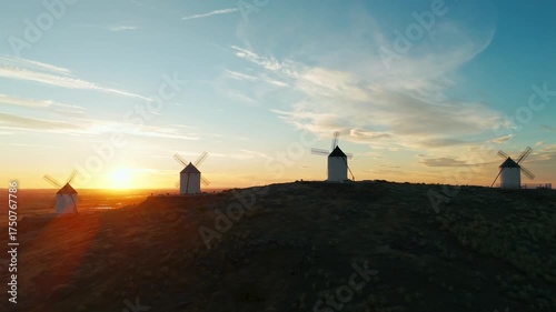 Aerial view of the windmills of Consuegra at sunrise, Castilla-La Mancha, Spain.
