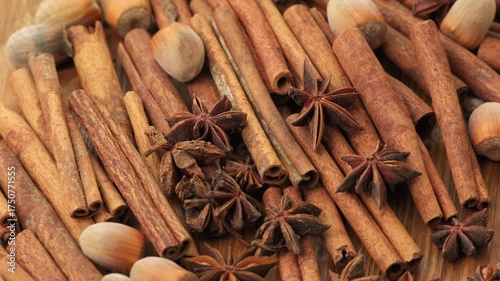 Warm Autumn and Winter Aromatic Spices with Cinnamon, Star Anise and Coffee Beans on Wooden Table for Cozy Kitchen and Holiday Mood