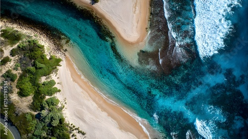Aerial view shows a stunning river mouth meeting the ocean waves.