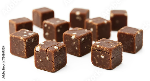 Delicious chocolate fudge cubes on a white background.