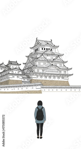 A person with a backpack stands before the majestic Himeji Castle in Japan.