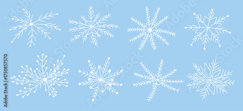 White snowflakes on a blue background in doodle style. Hand-drawn vector snowflake illustration. Festive frosty elements in a minimalist style. Snowflake icons, snow symbol. Snow
