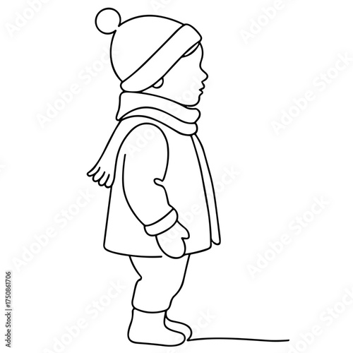 Child in winter clothes standing with a scarf and hat  
