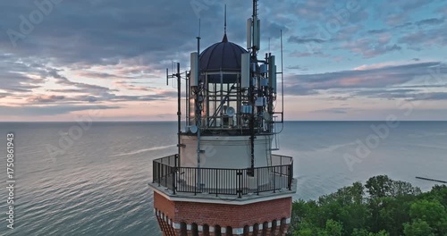 Beautiful lighthouse at sunset in Rewal at Baltic Sea.