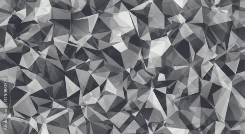 Abstract geometric pattern of gray and black triangular shapes creating a modern digital texture