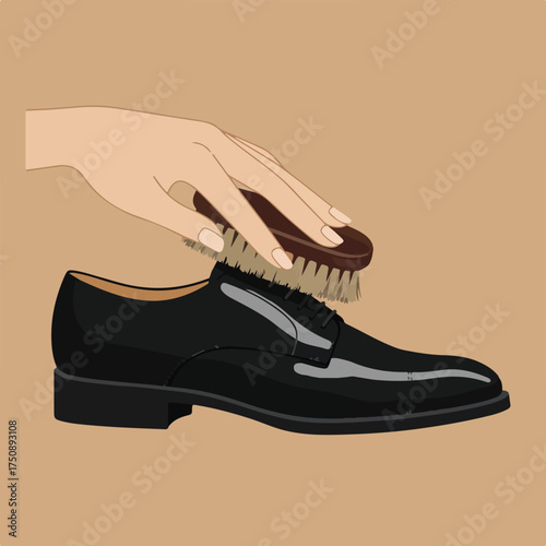 Polishing leather shoe with brush; hand visible