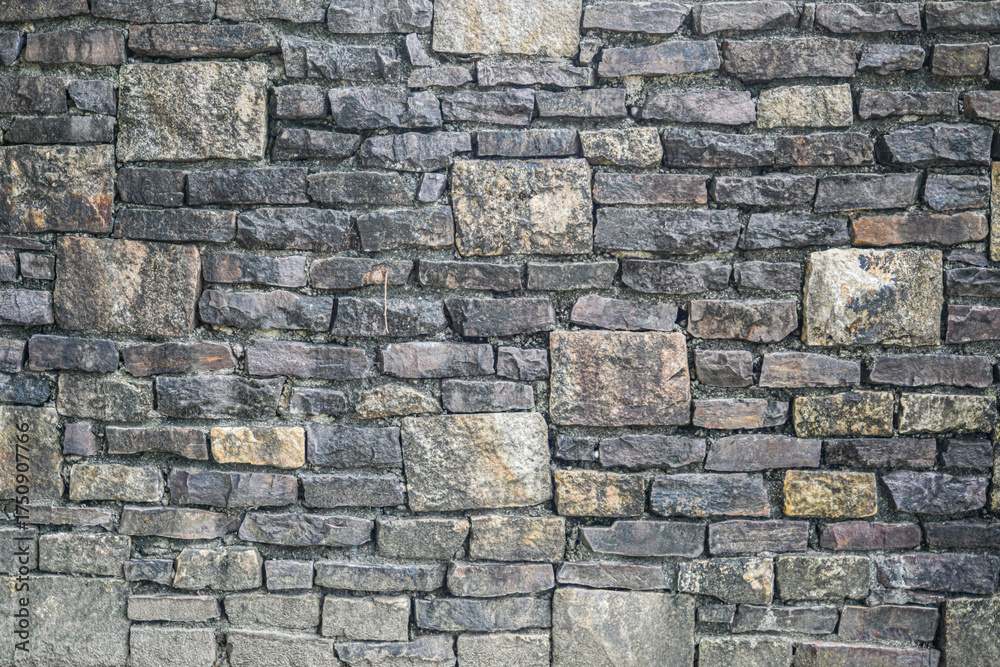 Fototapeta premium Old Stone Wall Texture in Traditional Japanese Setting