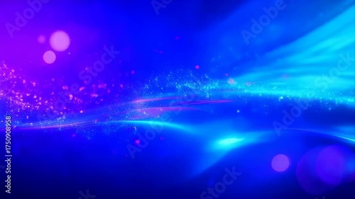Abstract Blue and Purple Streaks of Light with Floating Particles Creating a Cosmic Nebula Effect