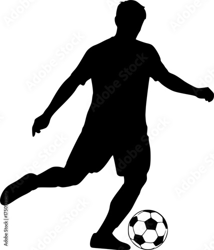 Silhouette of soccer player kicking ball
